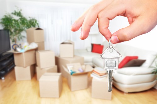 Home moving support with boxes and furniture in Chiswick