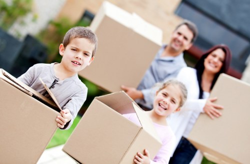 Staff preparing boxes and labels for an office relocation in Chiswick