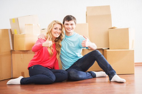 Family using mobile self storage during a house move in Chiswick
